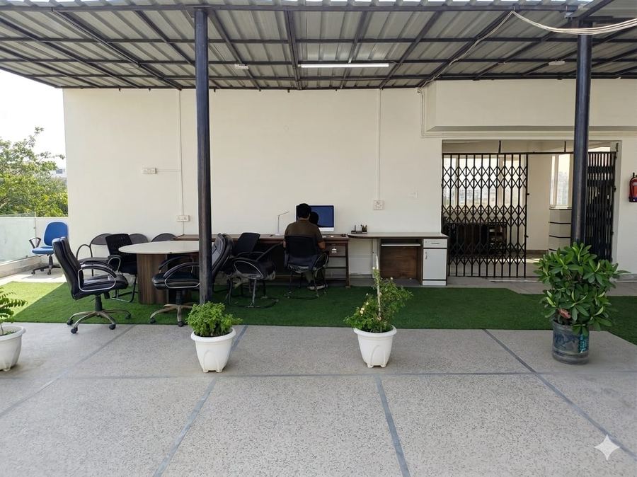 Pantry area with microwave, fridge and tea station — Achievers Library Paschim Vihar